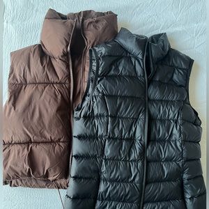 Brown Puffer Vest and Black Eddie Bauer Vest